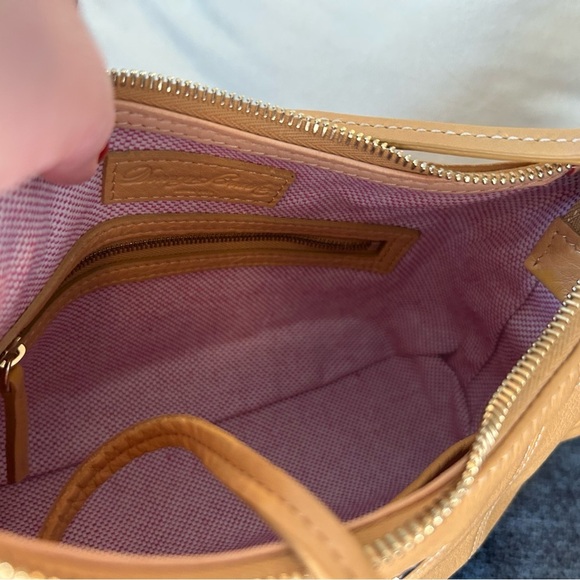 Dooney and Bourke Bag . Medium sized. Has imperfections . - Picture 10 of 17